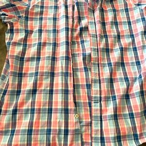 Good t shirt button down stripes never been wore